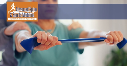 physical therapy with elder woman